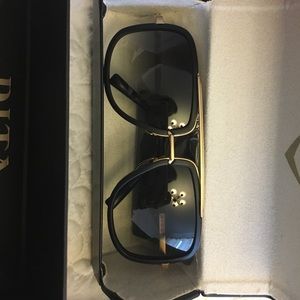 Brand new Dita Black and Gold glasses